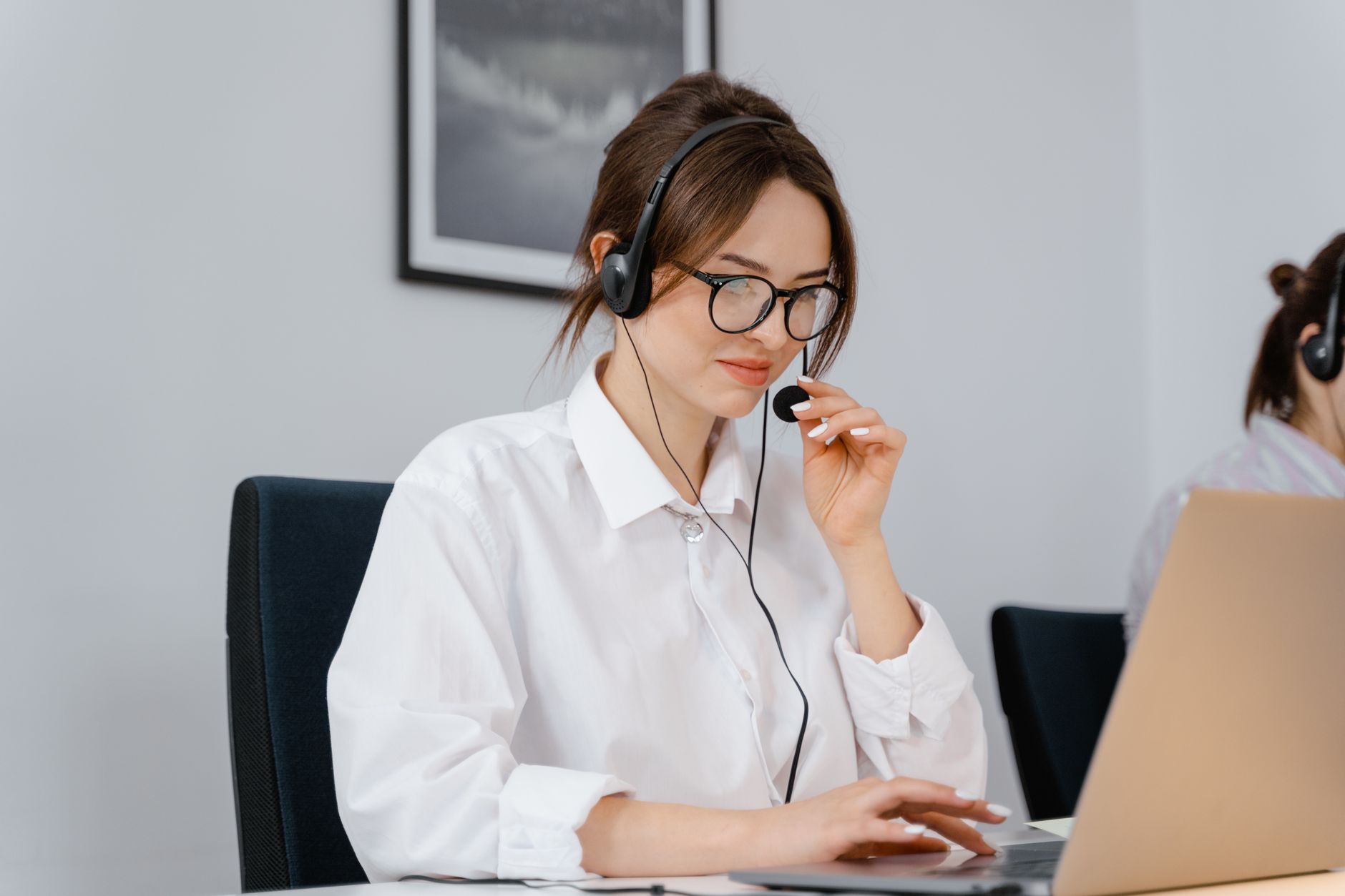 Technical support onboarding specialist helping travel advisor migrate client database